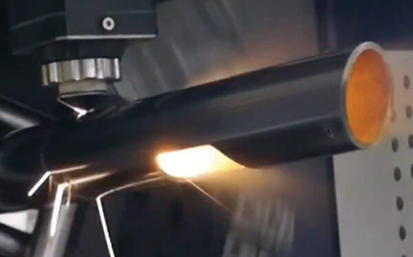 CSM Fibre Laser Machine cutting through a metal tube